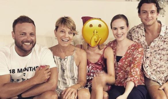 Sarie Kessler with her four children, Lachlan, Anya, Cameron, and the one whose face is covered with emoji is Margot Robbie.